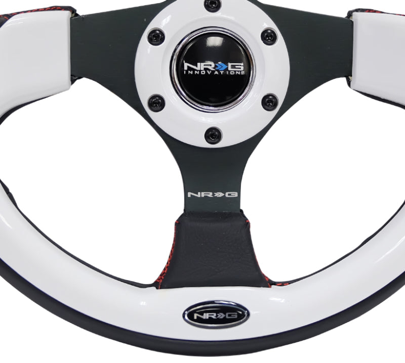 
                      
                        NRG Reinforced Steering Wheel (320mm) Blk w/White Trim & 4mm 3-Spoke
                      
                    